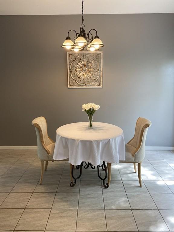 1 Arrowsic Street Worcester, MA 01606 - Photo 10 of 19 a view of a dining room with furniture and chandelier