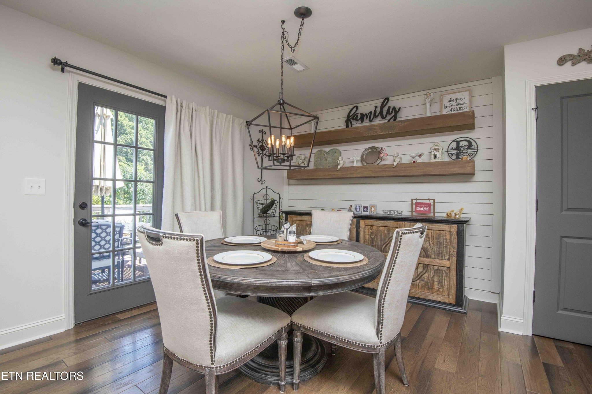 8320 Day Valley Road Powell, TN 37849 - Photo 14 of 35 a view of a dining room with furniture window and wooden floor