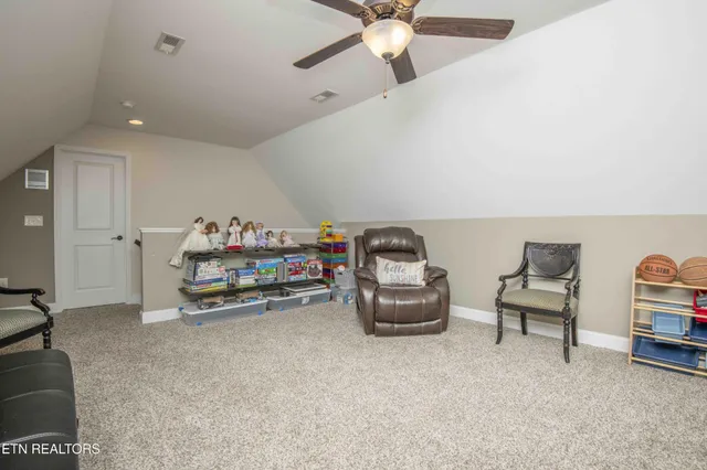 a view of a chairs and table in the patio