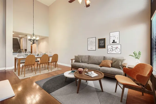 a living room with furniture and a table