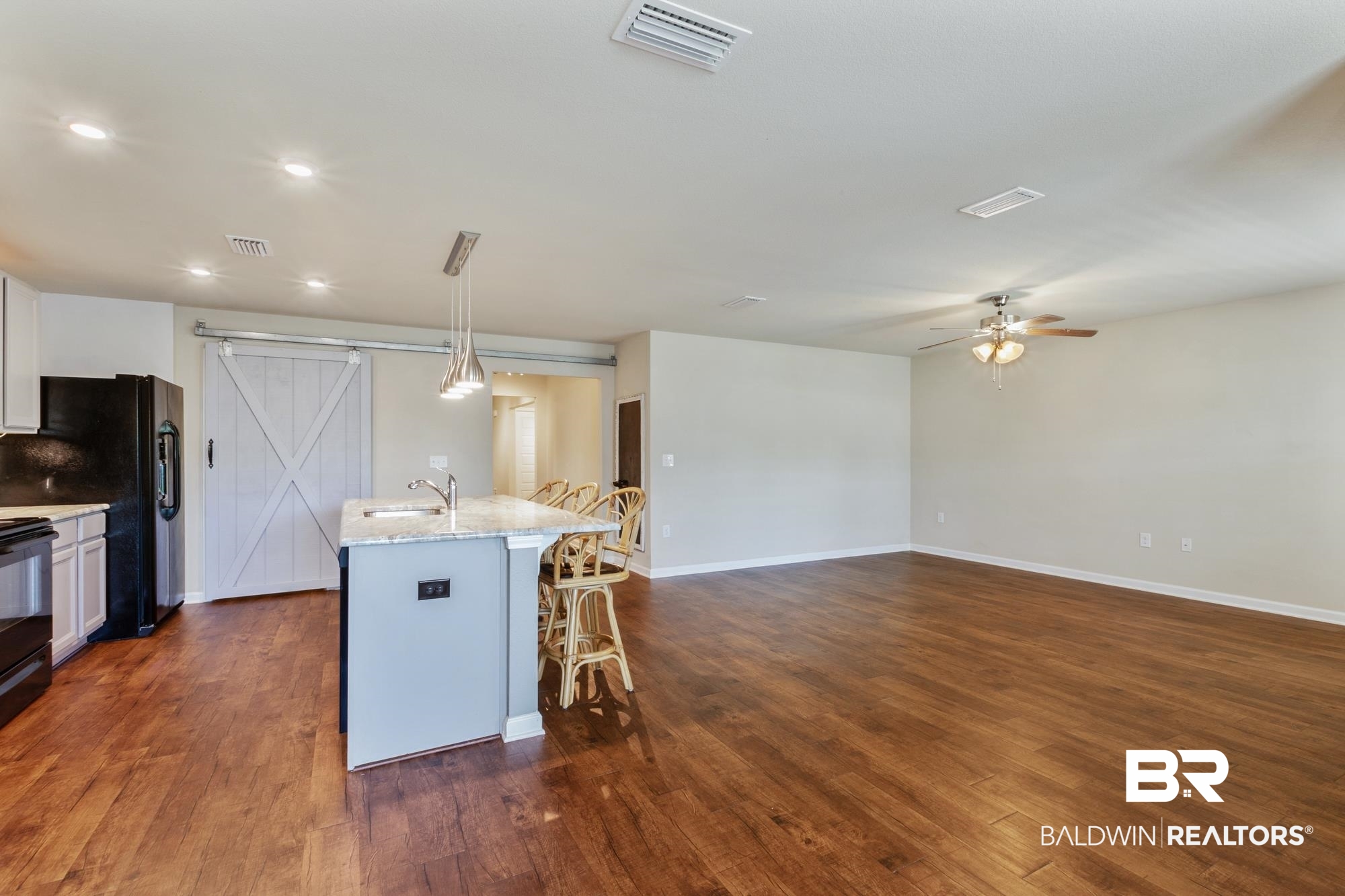 1687 Abbey Loop Foley, AL 36535 - Photo 6 of 34 Kitchen and Living Room