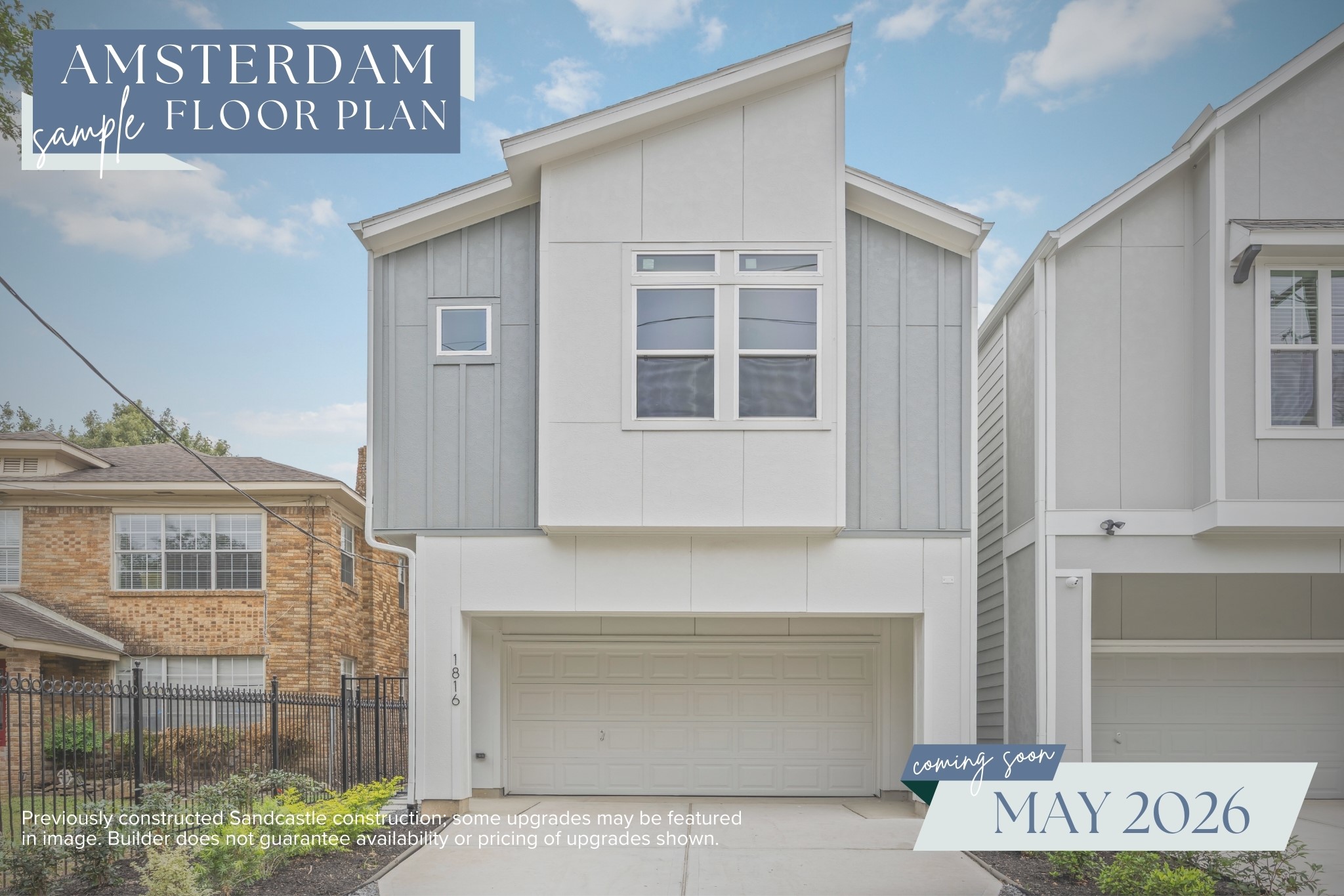 a front view of a house with garage