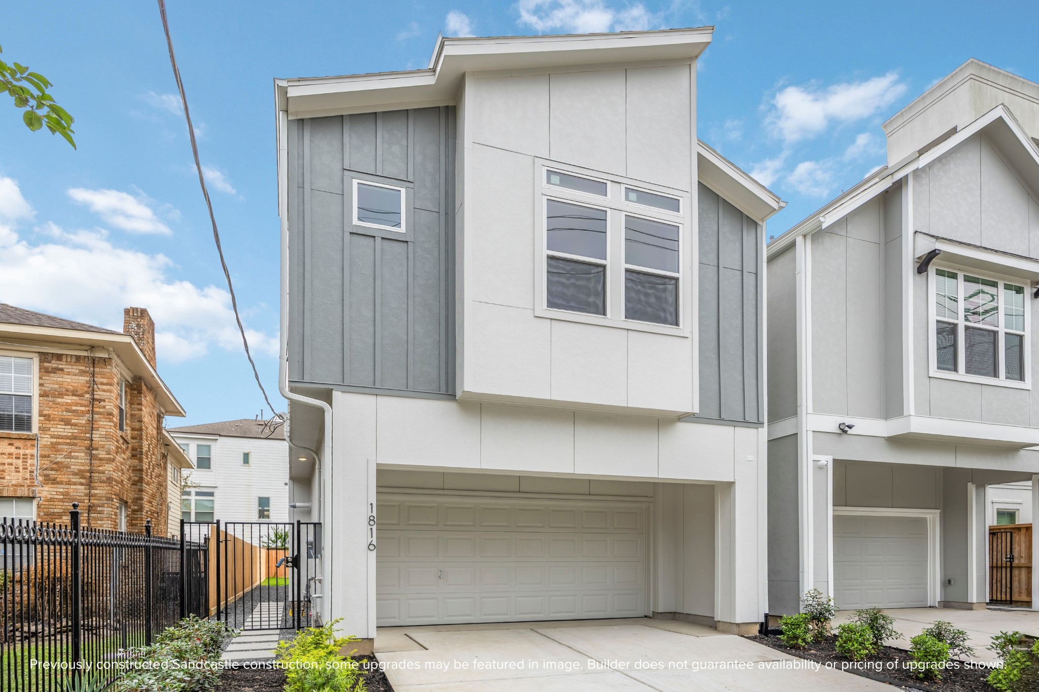 4317 Roseland Street, Unit B Houston, TX 77006 - Photo 36 of 36 a front view of a house with a garage