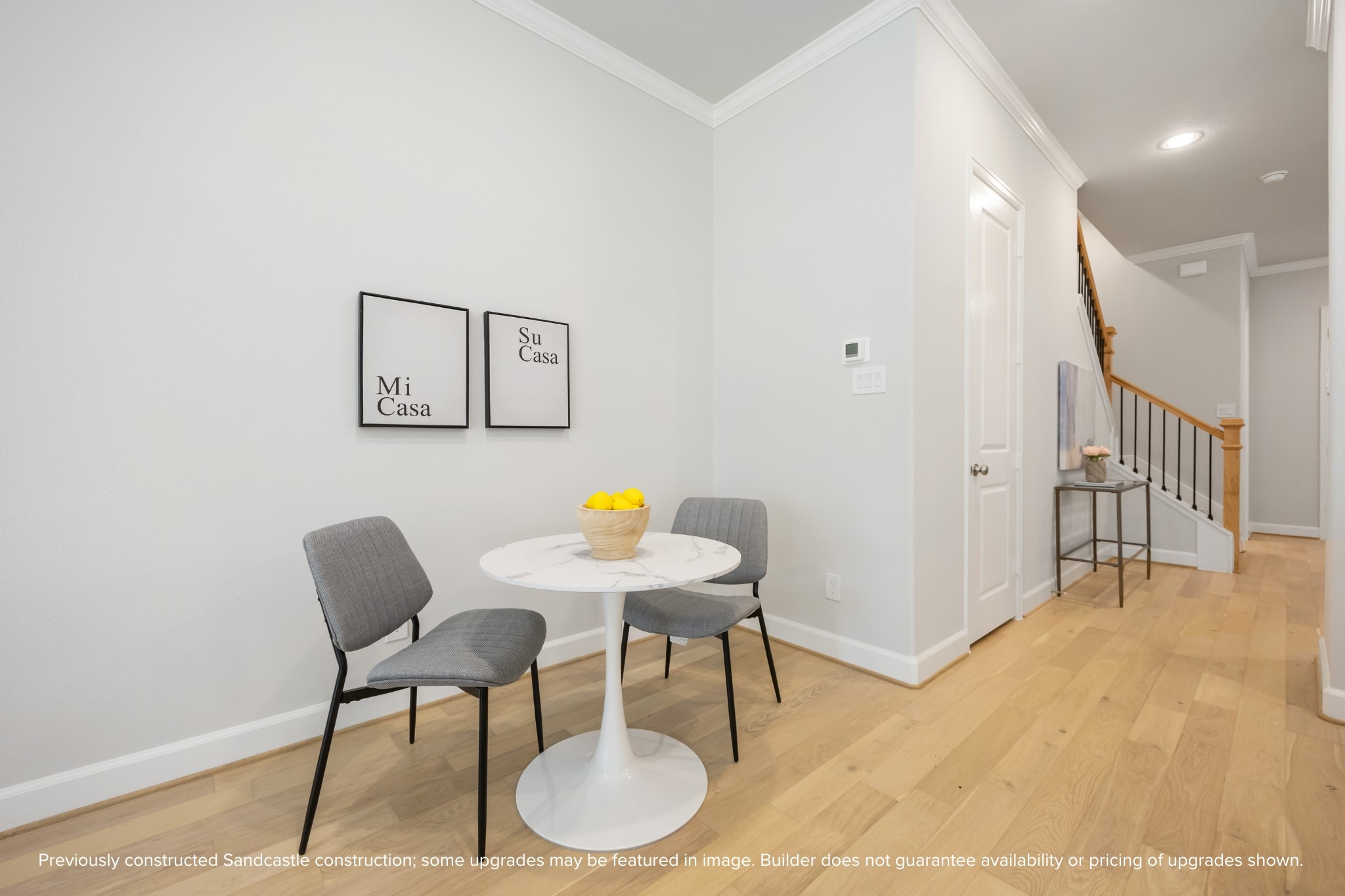 4317 Roseland Street, Unit B Houston, TX 77006 - Photo 8 of 36 a dining room with furniture and a chandelier