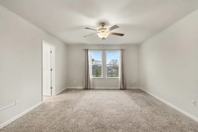 a bathroom with a double vanity sink and mirror