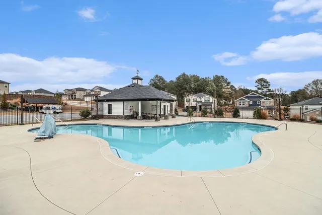 a view of a house with a swimming pool