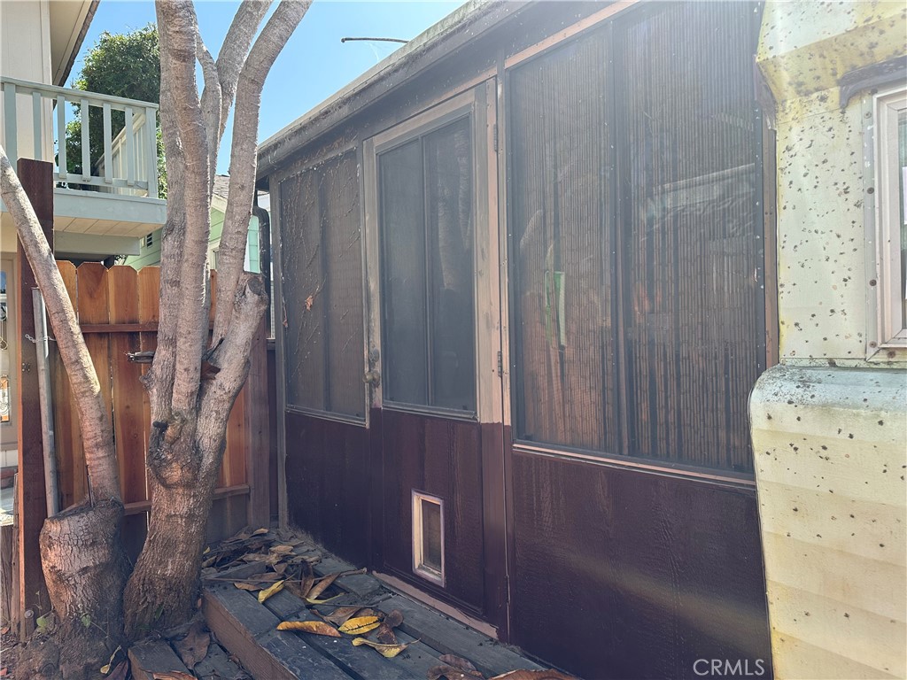 79 Riversea Road Seal Beach, CA 90740 - Photo 2 of 4 a door view with a small space
