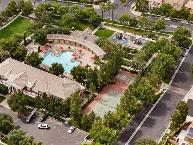 a view of a swimming pool with a yard