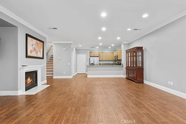 a view of a kitchen with a sink and a stove top oven