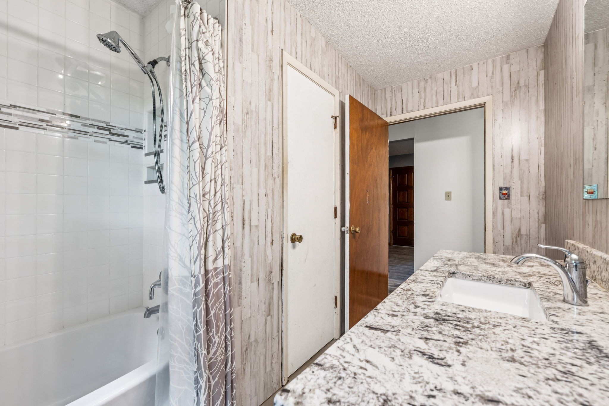 588 Sweeton Hill Road Coalmont, TN 37313 - Photo 13 of 51 a bathroom with a bathtub and shower