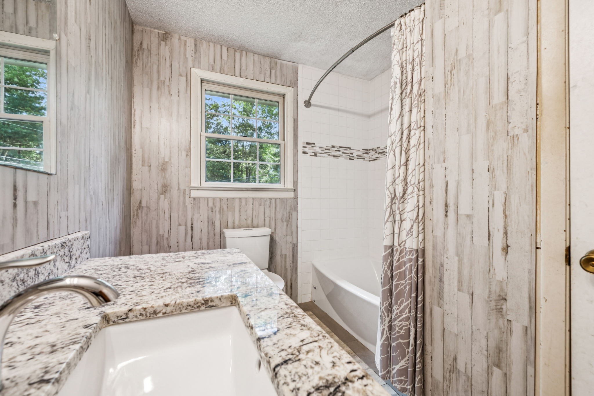 588 Sweeton Hill Road Coalmont, TN 37313 - Photo 14 of 51 a bedroom with a bed and a window