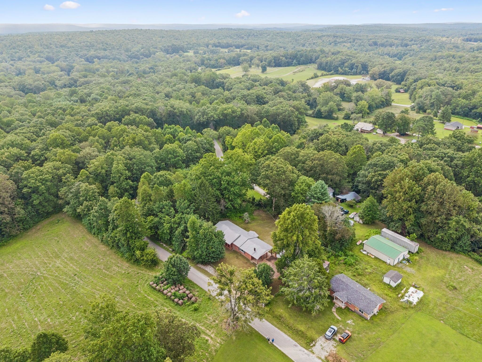 588 Sweeton Hill Road Coalmont, TN 37313 - Photo 40 of 51 an aerial view of residential houses with outdoor space and trees