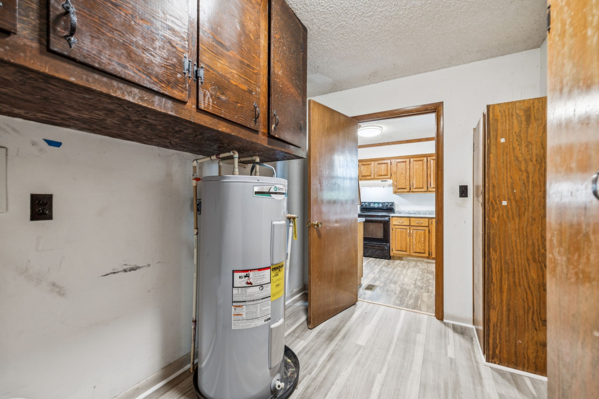 588 Sweeton Hill Road Coalmont, TN 37313 - Photo 6 of 51 a kitchen with refrigerator and window