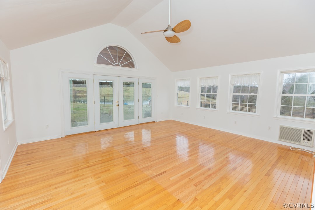 5584 The Falls Road Crewe, VA 23930 - Photo 5 of 29 a view of an empty room with wooden floor and windows