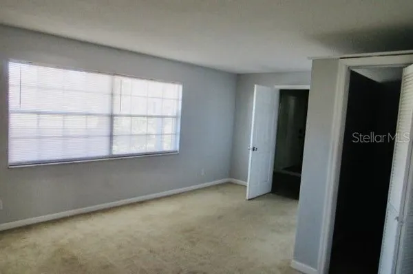 an empty room with a window