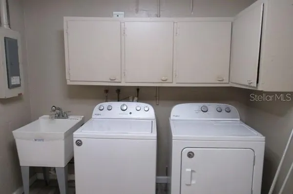 a utility room with dryer and washer