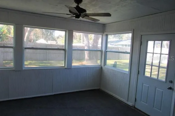 a view of an empty room and window