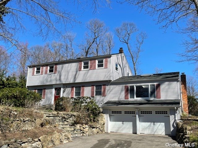 a house view with a garden space