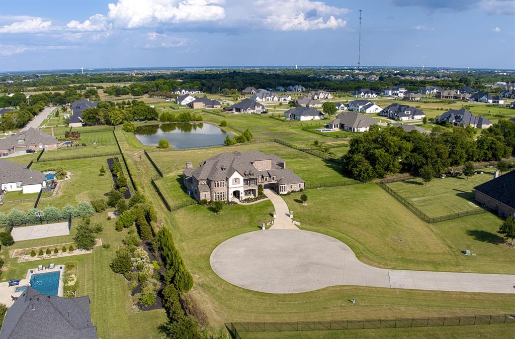 901 Inverness Court Lucas, TX 75002 - Photo 40 of 40 Aerial view of residential area featuring a nearby body of water