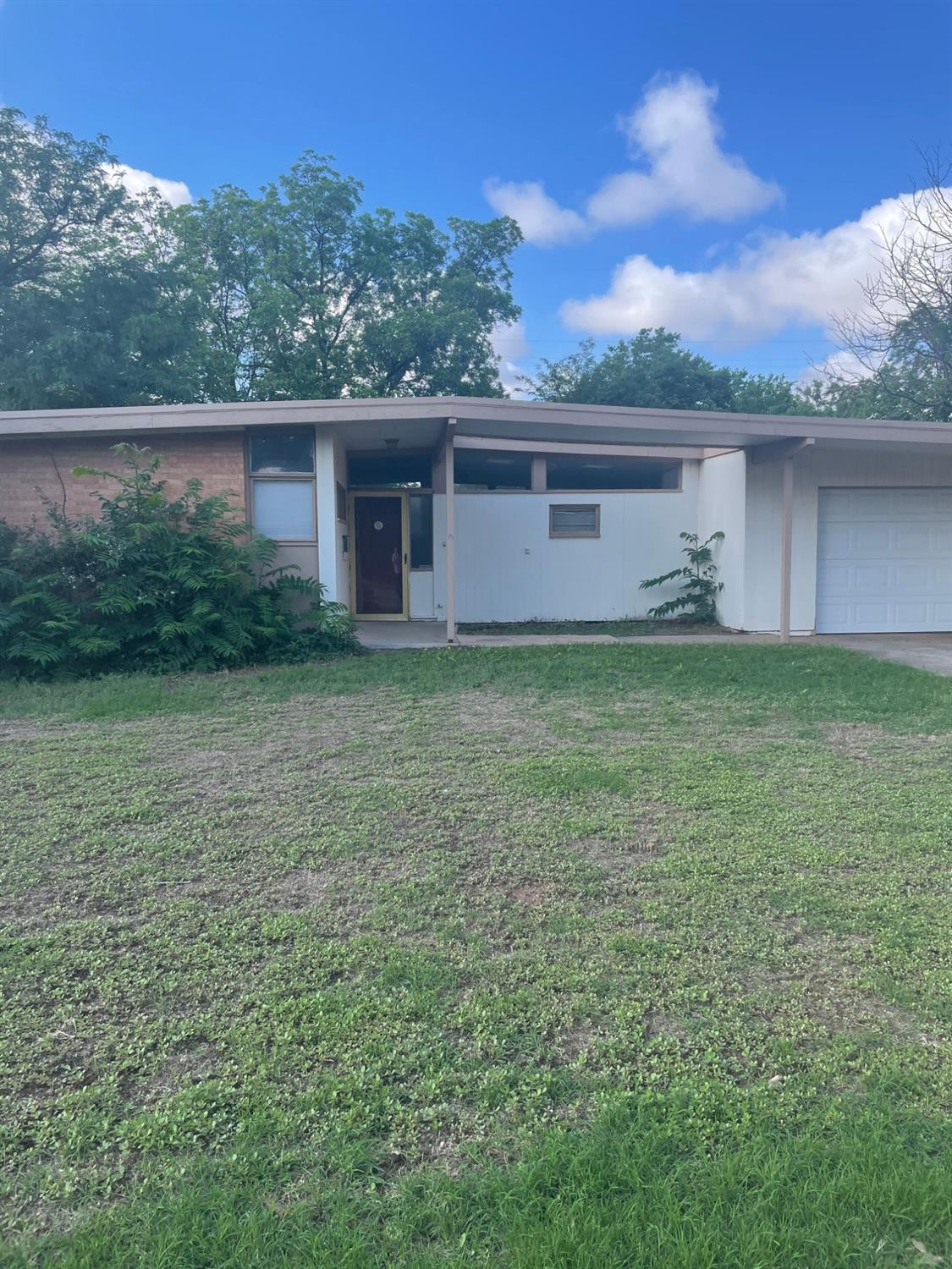 2507 45th Street Lubbock, TX 79413 - Photo 1 of 1 a view of a yard in front of a house