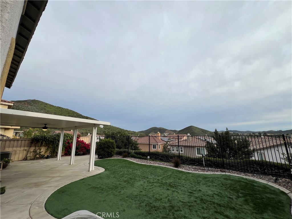 35429 Saddle Hill Road Lake Elsinore, CA 92532 - Photo 12 of 27 a view of a building with a yard