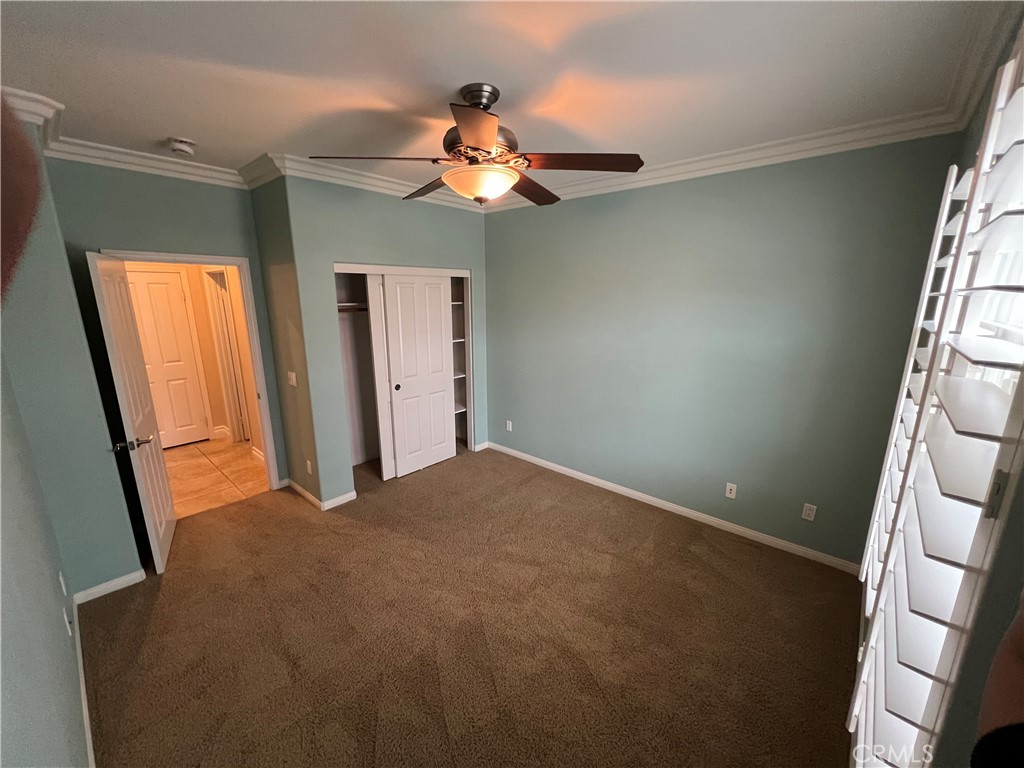 35429 Saddle Hill Road Lake Elsinore, CA 92532 - Photo 15 of 27 a view of a livingroom with a ceiling fan and window