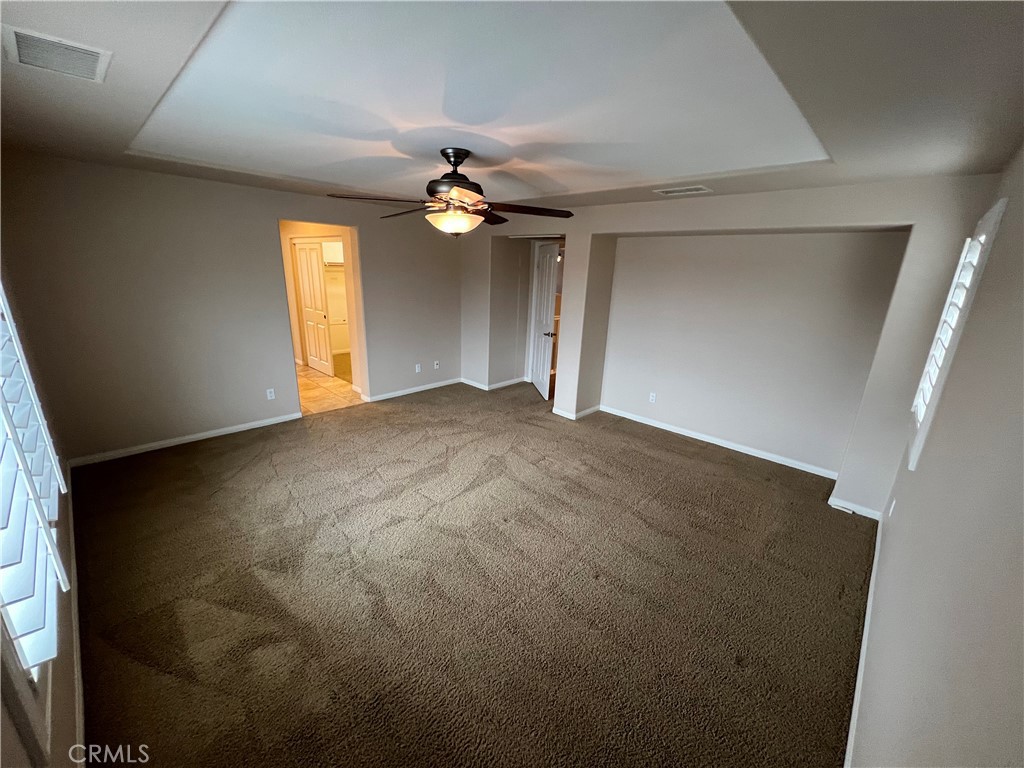 35429 Saddle Hill Road Lake Elsinore, CA 92532 - Photo 22 of 27 wooden floor in an empty room with a window