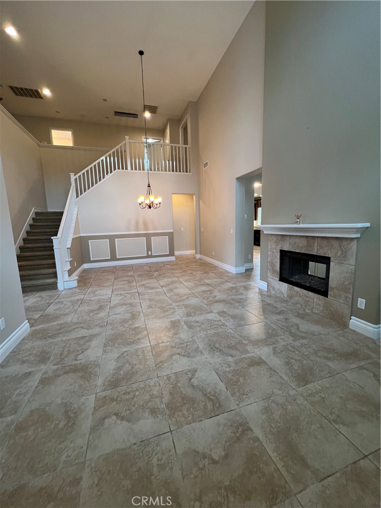 35429 Saddle Hill Road Lake Elsinore, CA 92532 - Photo 4 of 27 a view of a livingroom with a fireplace