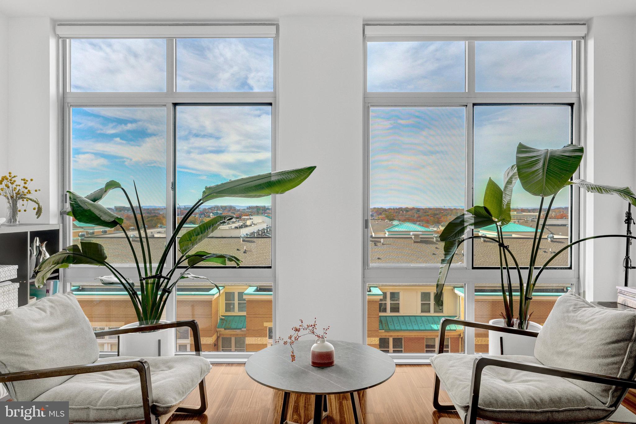 11990 Market Street, Unit 614 Reston, VA 20190 - Photo 22 of 43 a living room with furniture