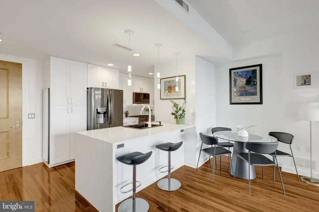 a view of kitchen with cabinets and stainless steel appliances