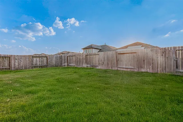 a view of a backyard with a garden
