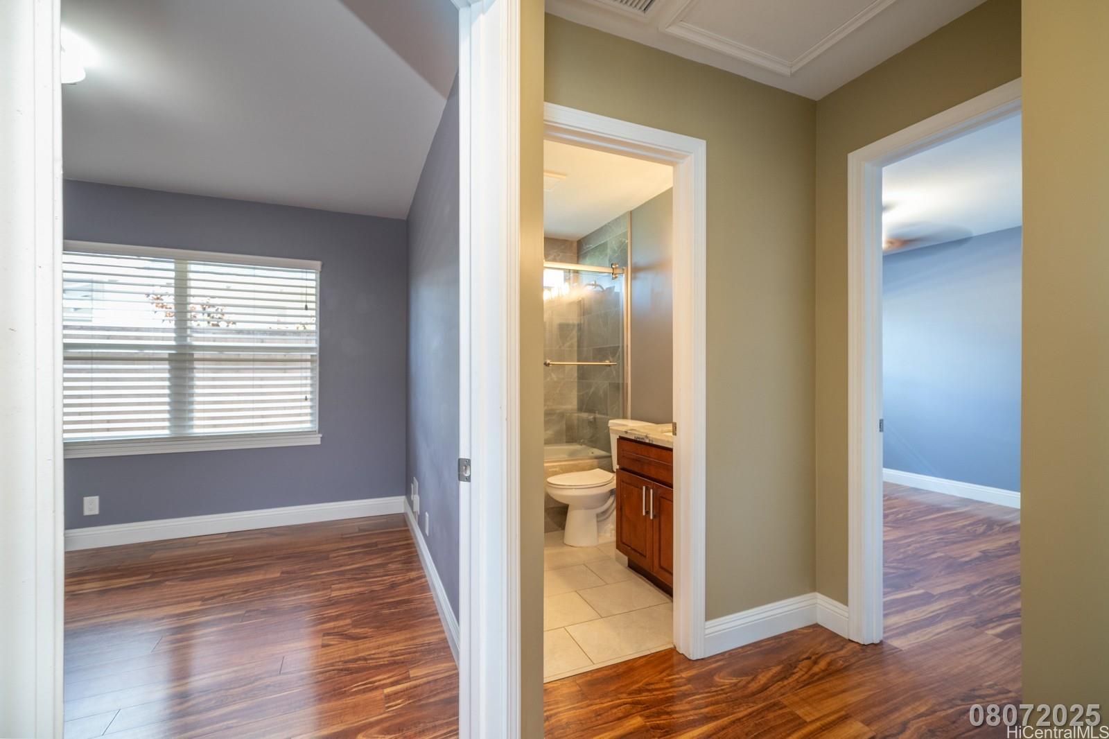 91-1014 Alepa Street Kapolei, HI 96707 - Photo 15 of 25 a view of a bathroom from a hallway