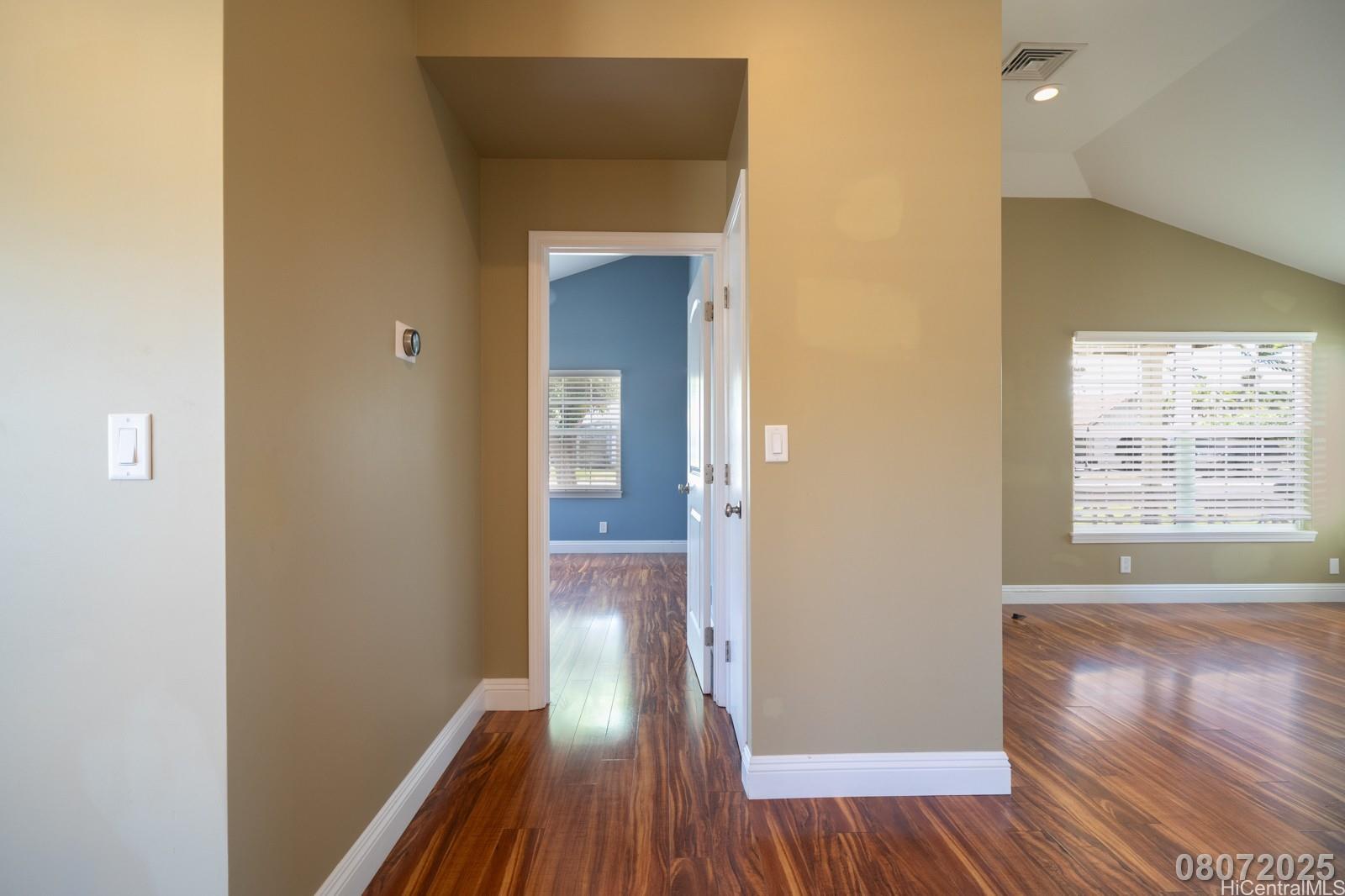 91-1014 Alepa Street Kapolei, HI 96707 - Photo 21 of 25 a view of a hallway with wooden floor