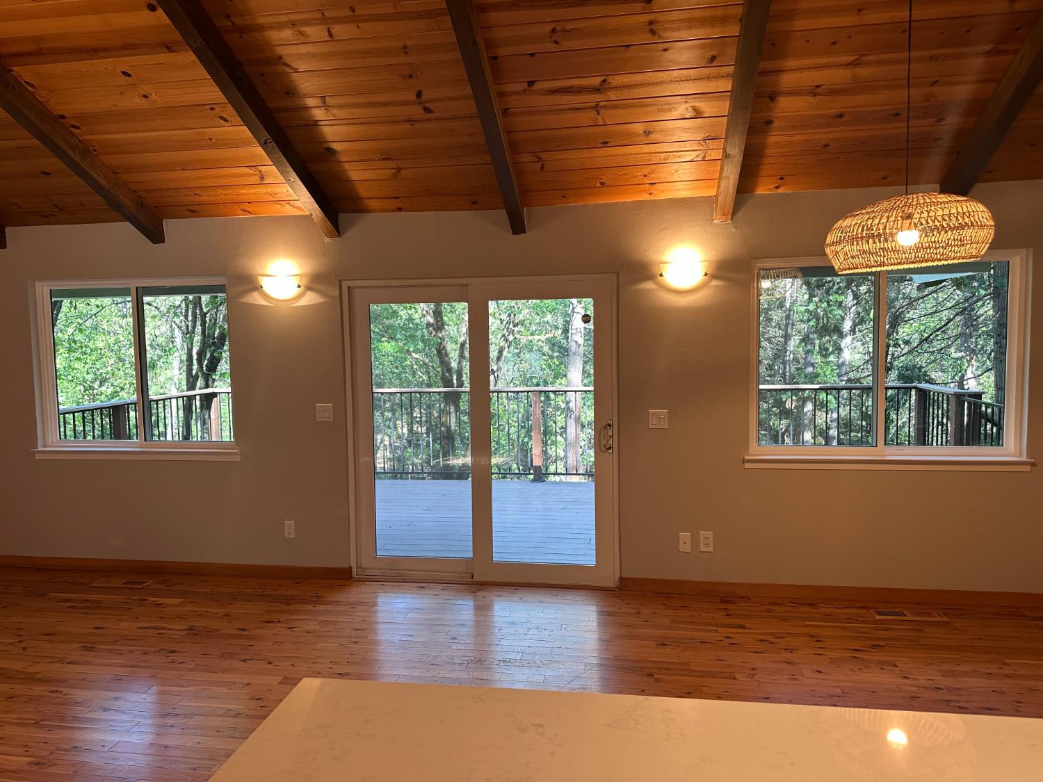 5570 5 Spot Road Placerville, CA 95667 - Photo 19 of 38 a view of an empty room with a window and wooden floor