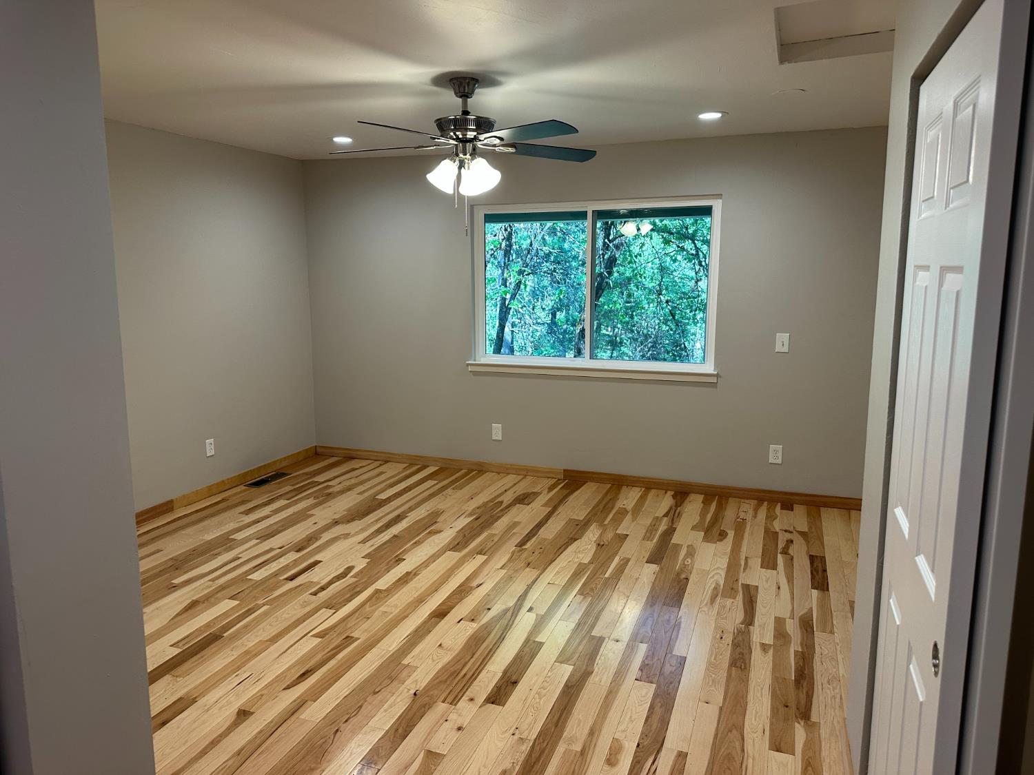 5570 5 Spot Road Placerville, CA 95667 - Photo 20 of 38 a view of an empty room and window