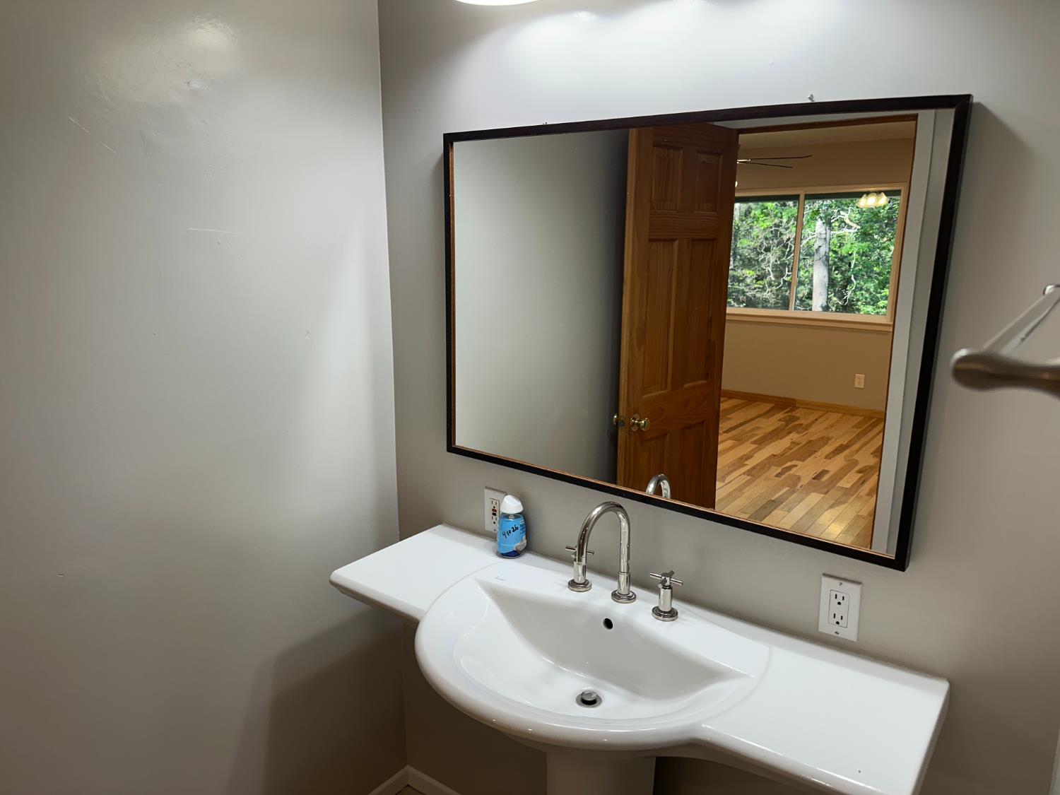 5570 5 Spot Road Placerville, CA 95667 - Photo 24 of 38 a bathroom with a sink and a mirror
