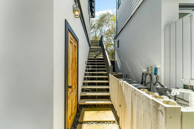 a bathroom with a tub and shower