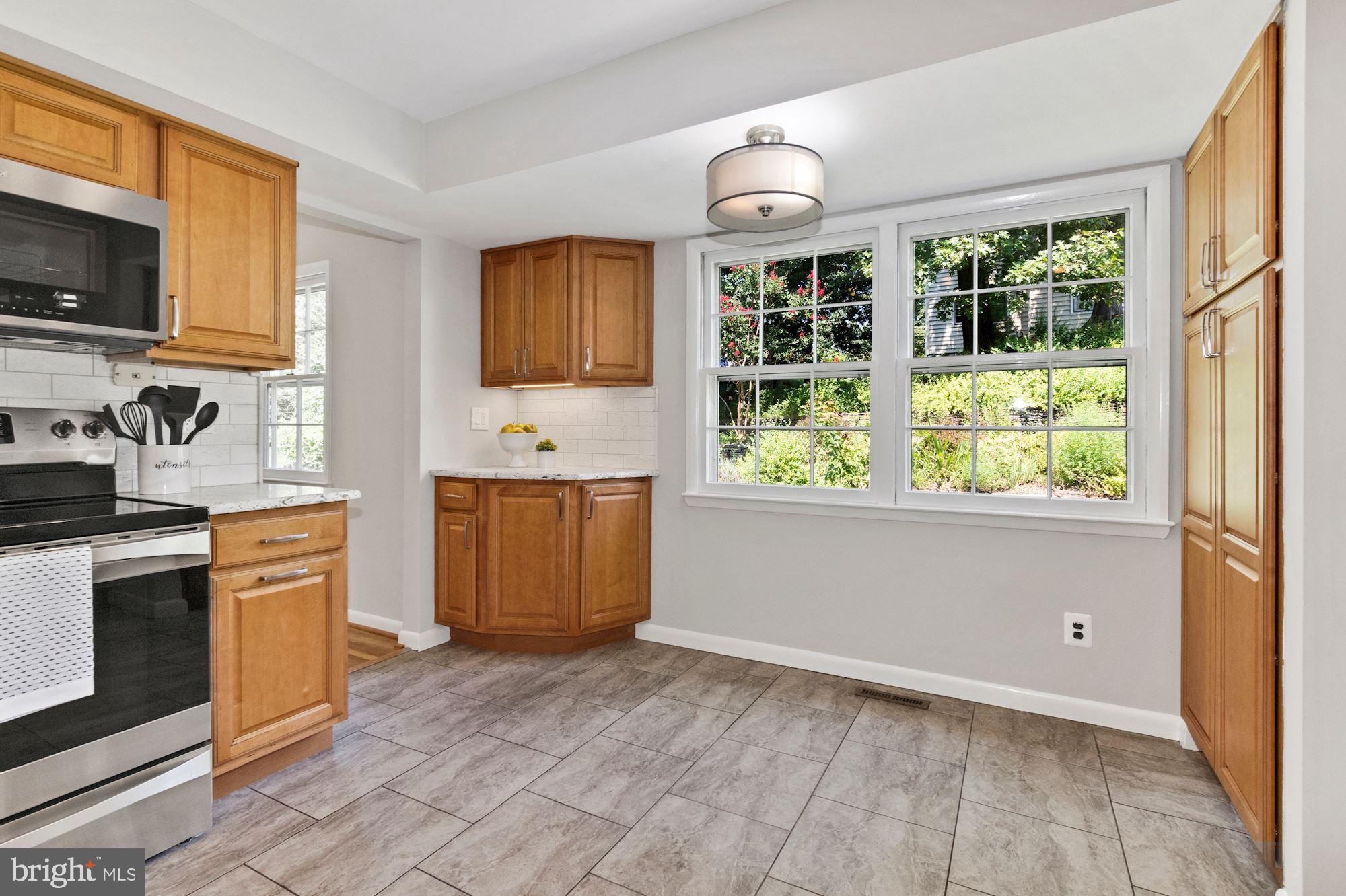 1010 Cannon Road Silver Spring, MD 20904 - Photo 12 of 31 Bright eat-in kitchen area and a large pantry