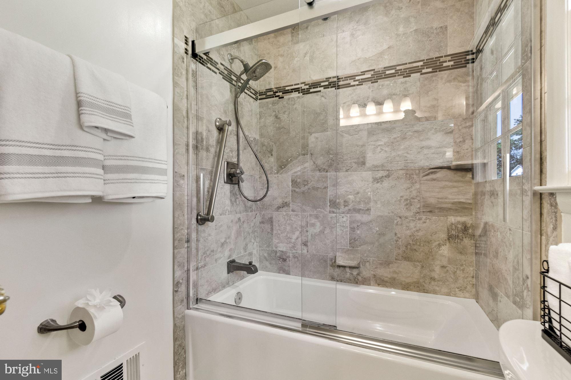1010 Cannon Road Silver Spring, MD 20904 - Photo 26 of 31 Beautiful tile and glass tub/shower enclosure