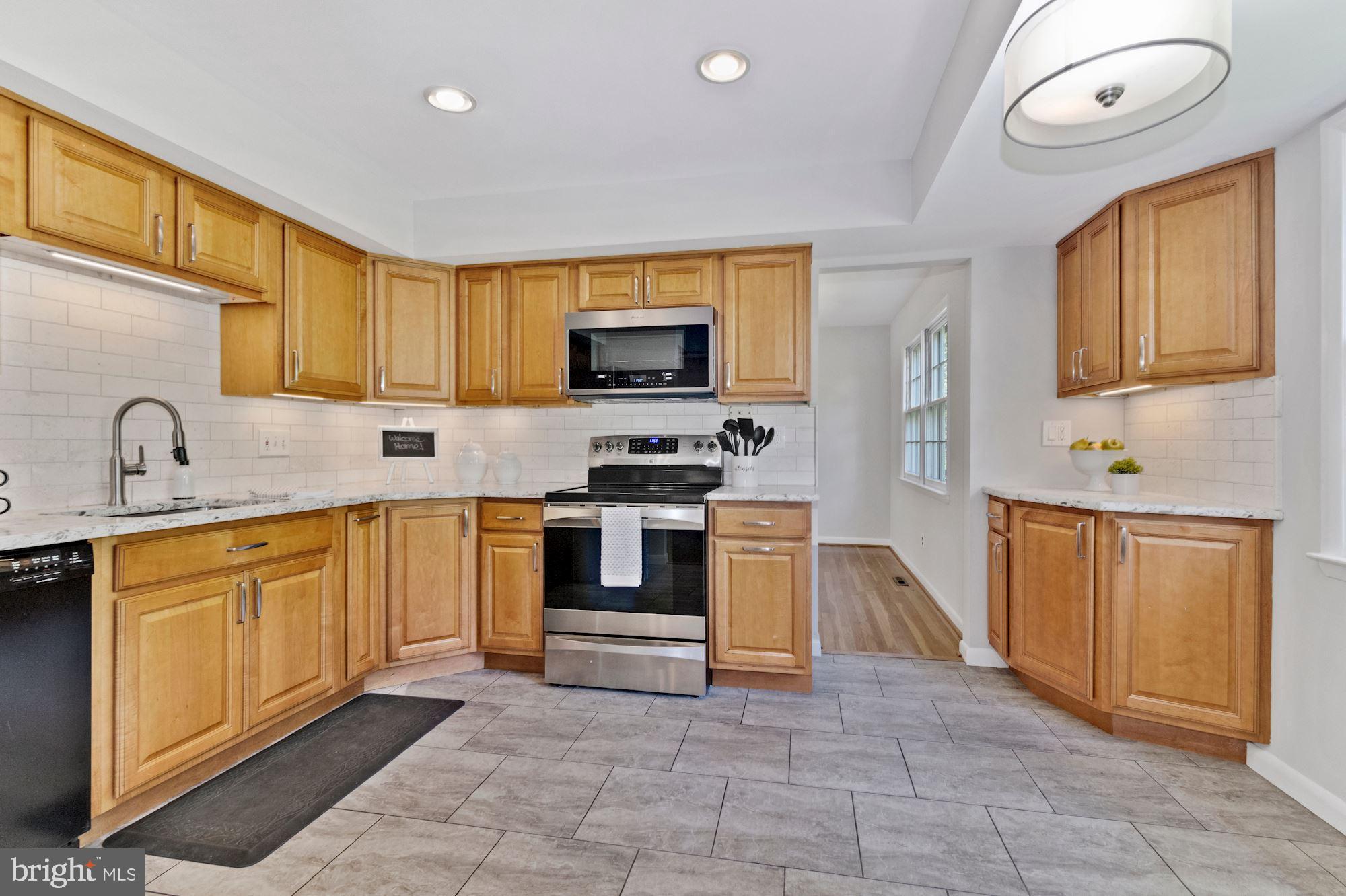 1010 Cannon Road Silver Spring, MD 20904 - Photo 10 of 31 Beautiful quartz countertops and recess lighting