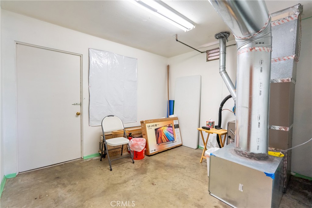 3388 Ramona Road Atascadero, CA 93422 - Photo 35 of 55 Next to the office you will find a utility room. It can be used for additional storage or a workshop area.