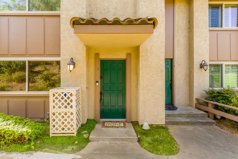 a front view of a house with a outdoor space