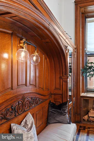 a view of a entryway door with a couch