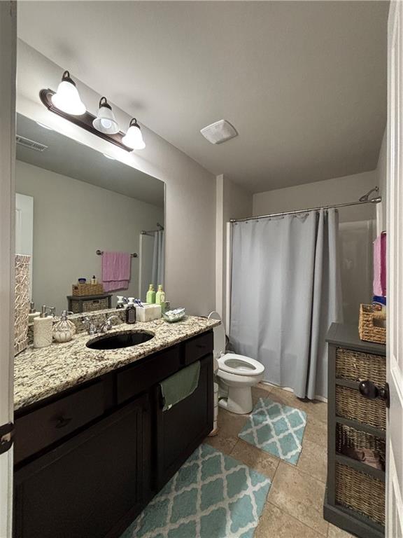 3459 In Bloom Way Auburn, GA 30011 - Photo 20 of 35 a bathroom with a double vanity sink and a mirror