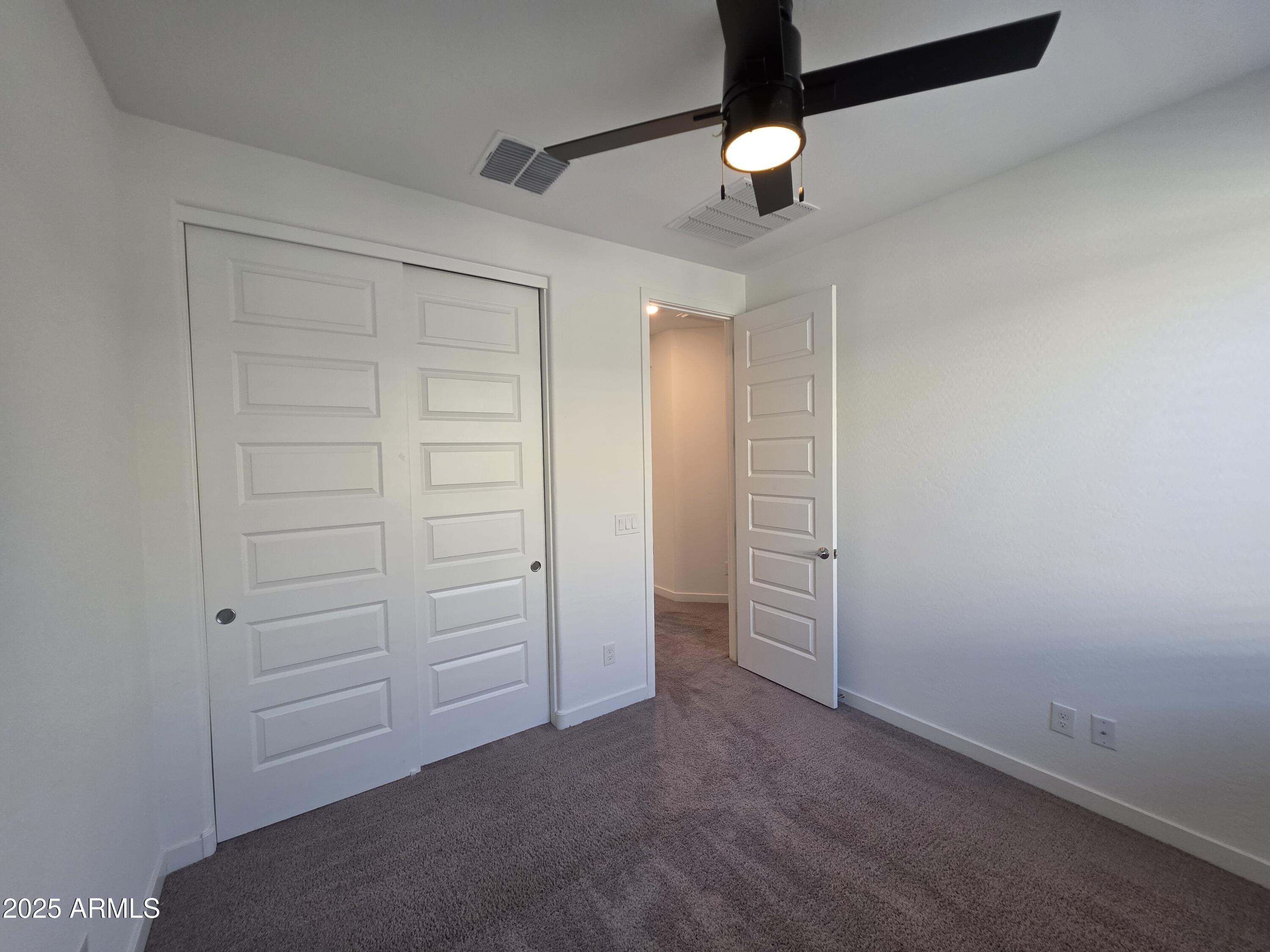 319 Pinnacle Ridge Drive San Tan Valley, AZ 85140 - Photo 15 of 25 wooden floor in an empty room