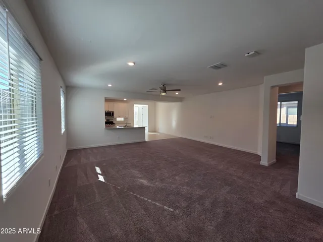 a view of a livingroom and a window