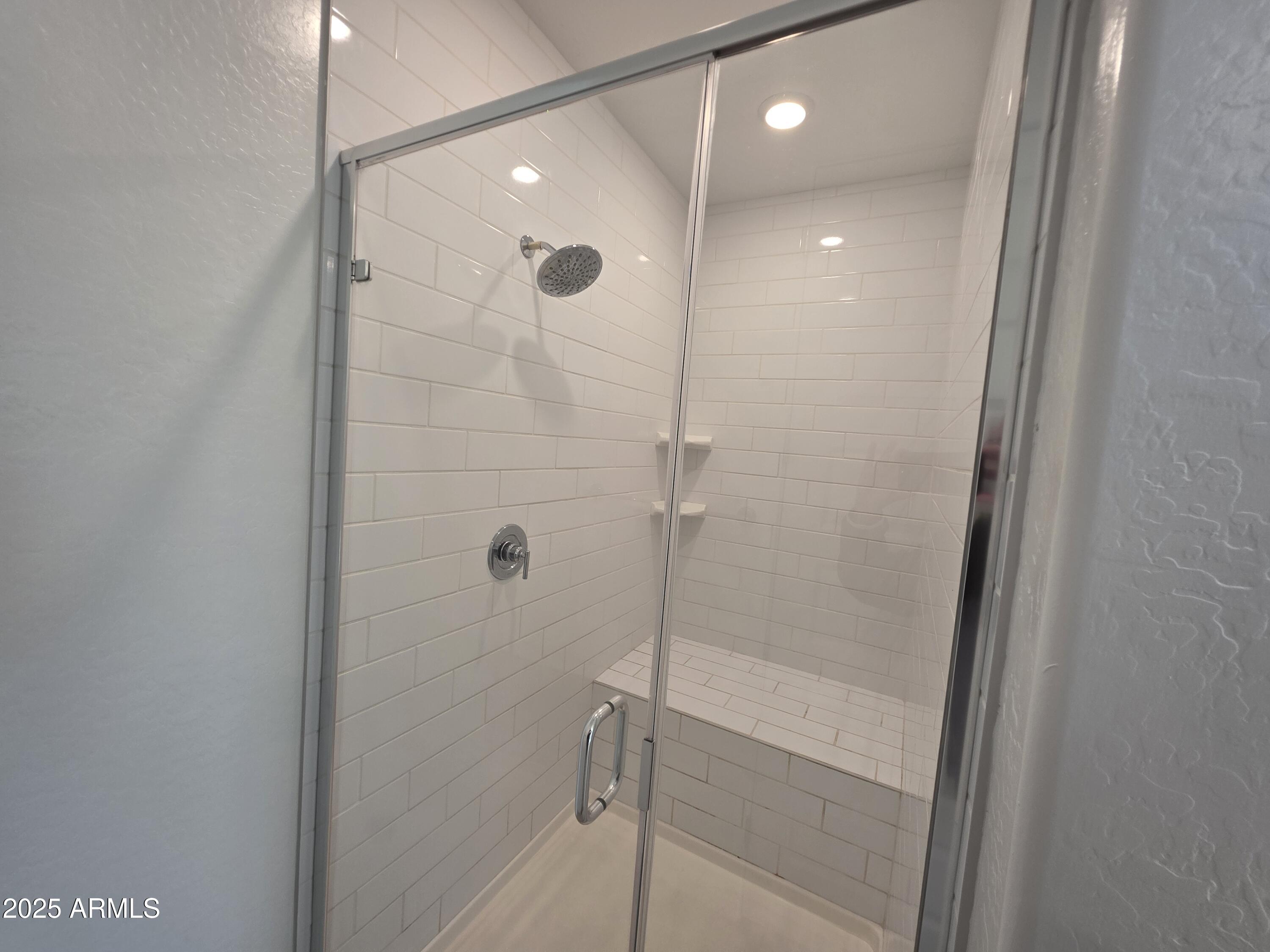 319 Pinnacle Ridge Drive San Tan Valley, AZ 85140 - Photo 8 of 25 a bathroom with a shower and a sink