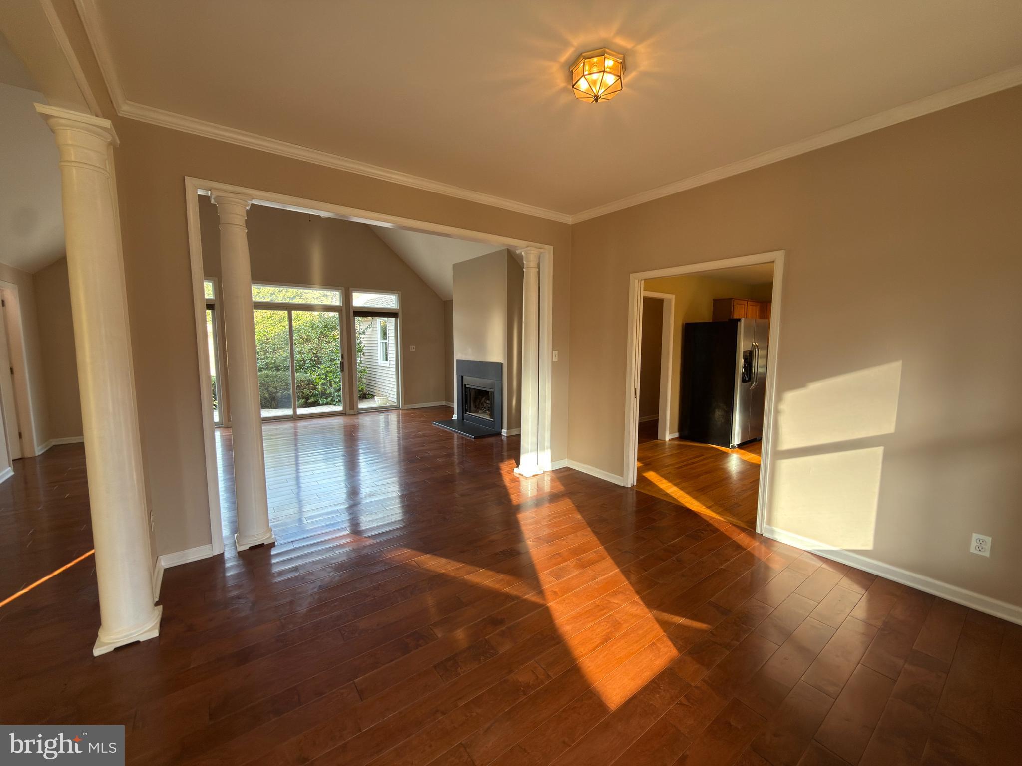 839 Frank Road West Chester, PA 19380 - Photo 11 of 30 a view of a hallway with wooden floor and a living room