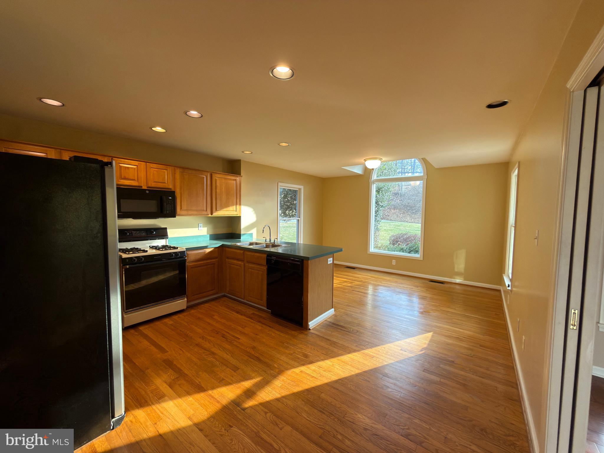 839 Frank Road West Chester, PA 19380 - Photo 12 of 30 a kitchen with granite countertop a refrigerator and a stove top oven