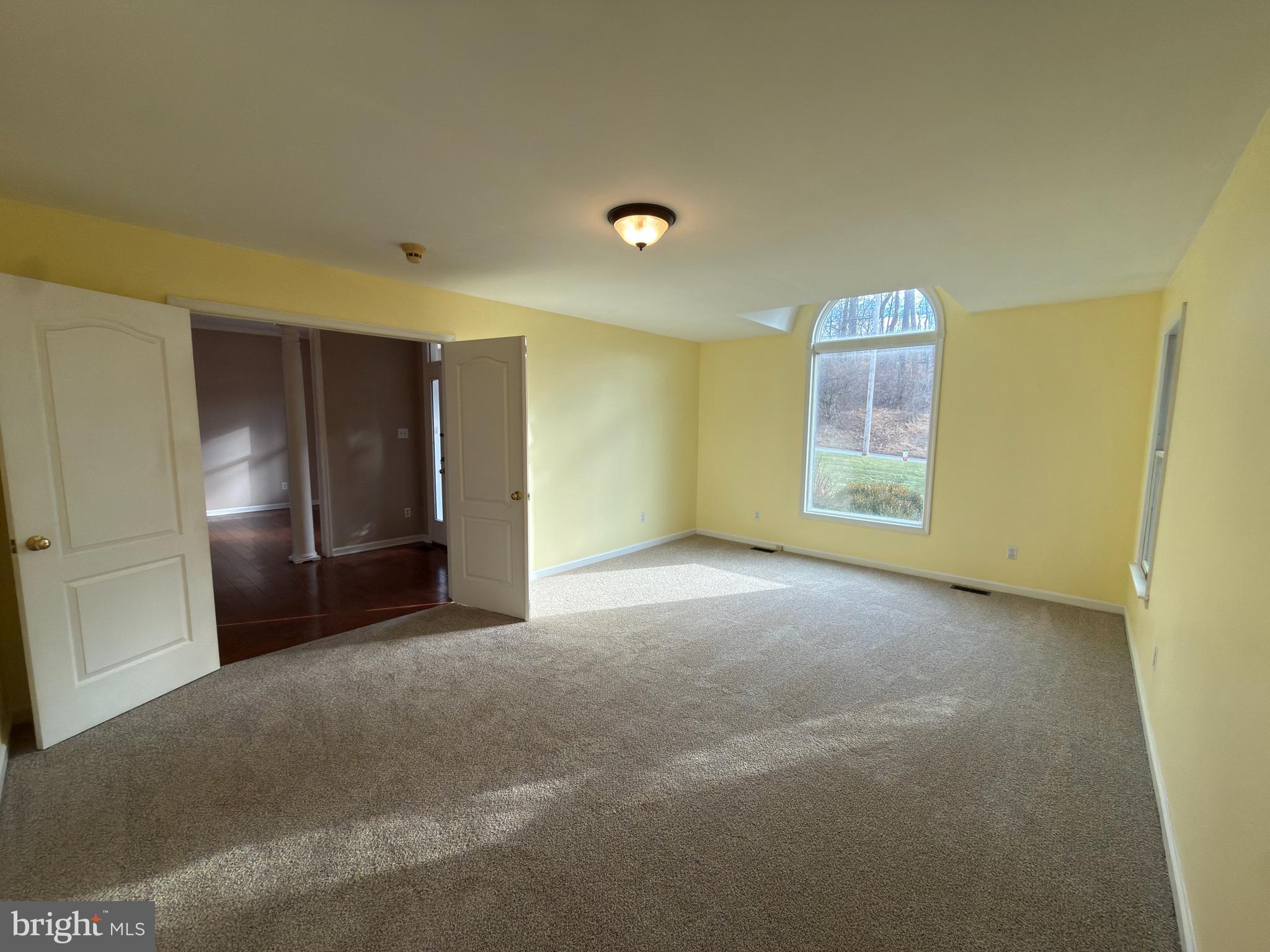 839 Frank Road West Chester, PA 19380 - Photo 16 of 30 a view of an empty room with a window
